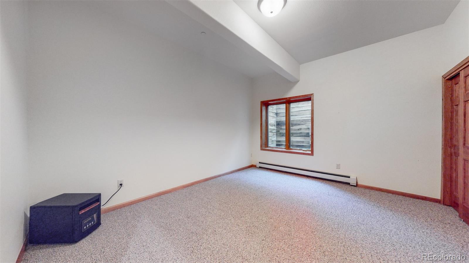 153 Ski Road East Allenspark, CO 80510 - Photo 33 of 40 a view of an empty room and window