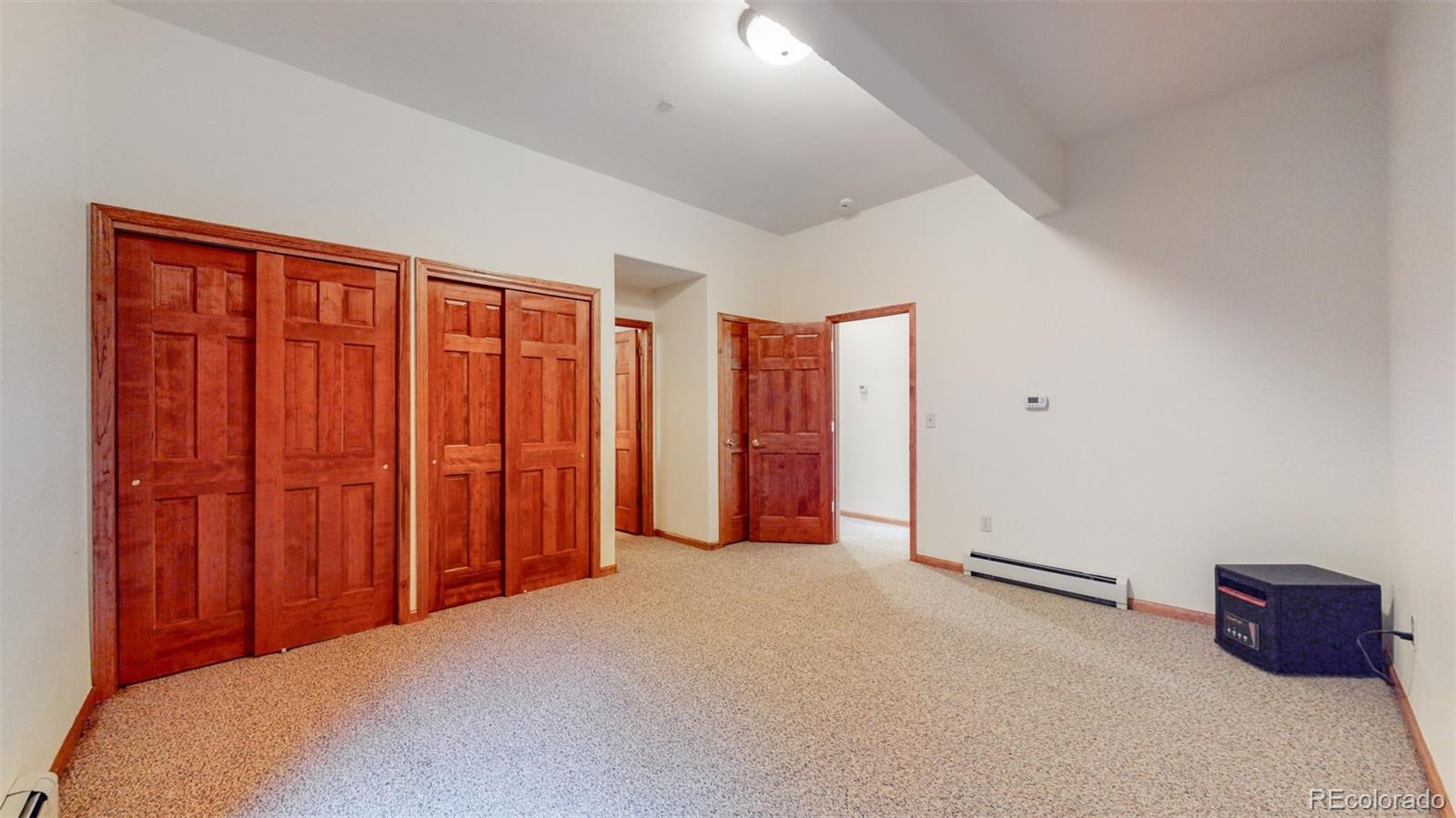 153 Ski Road East Allenspark, CO 80510 - Photo 34 of 40 a view of an empty room and closet area