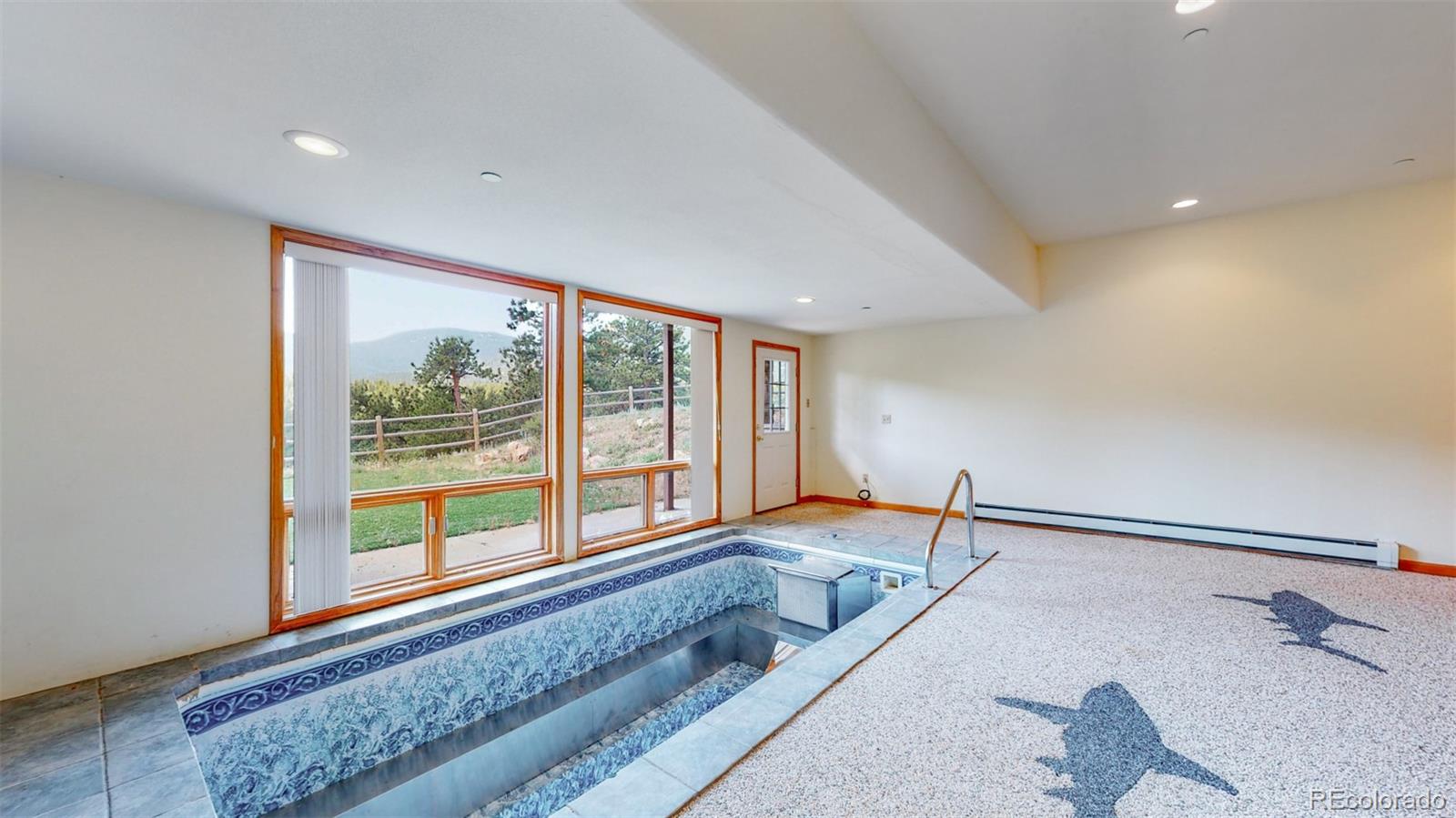 153 Ski Road East Allenspark, CO 80510 - Photo 36 of 40 a hallway with a large window