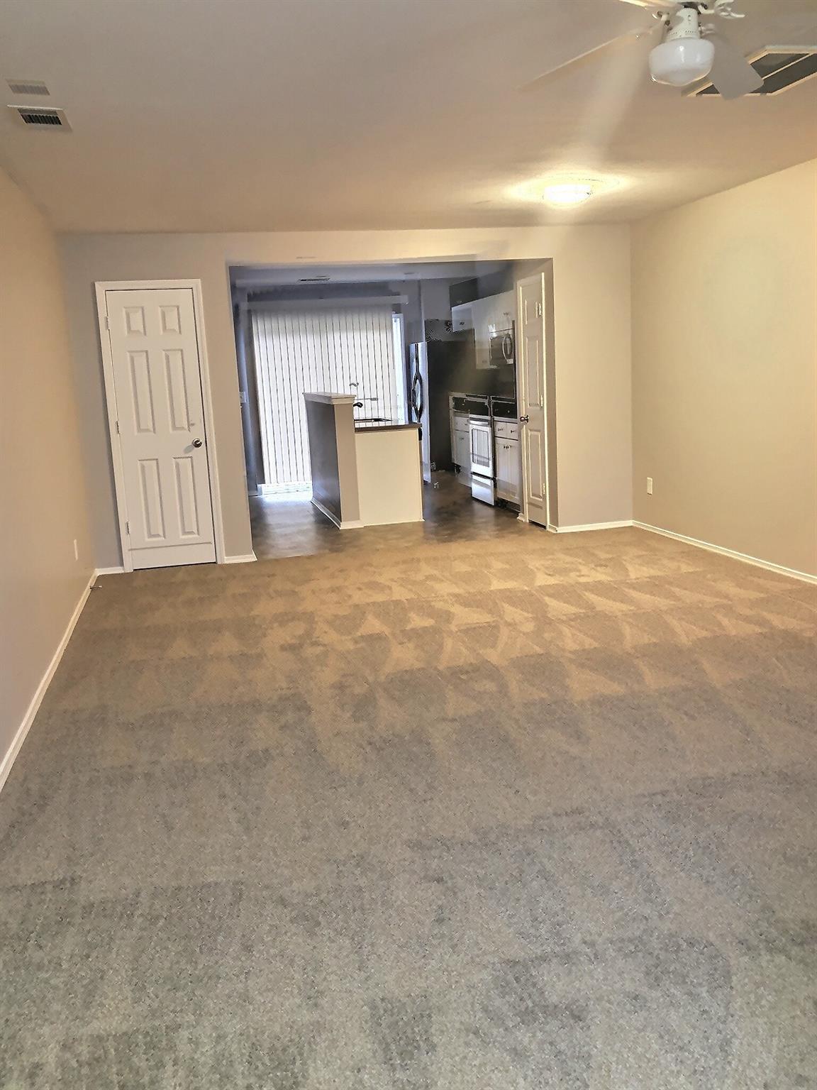 338 River Clay Road Fort Mill, SC 29708 - Photo 4 of 18 a view of empty room with a fireplace and cabinet