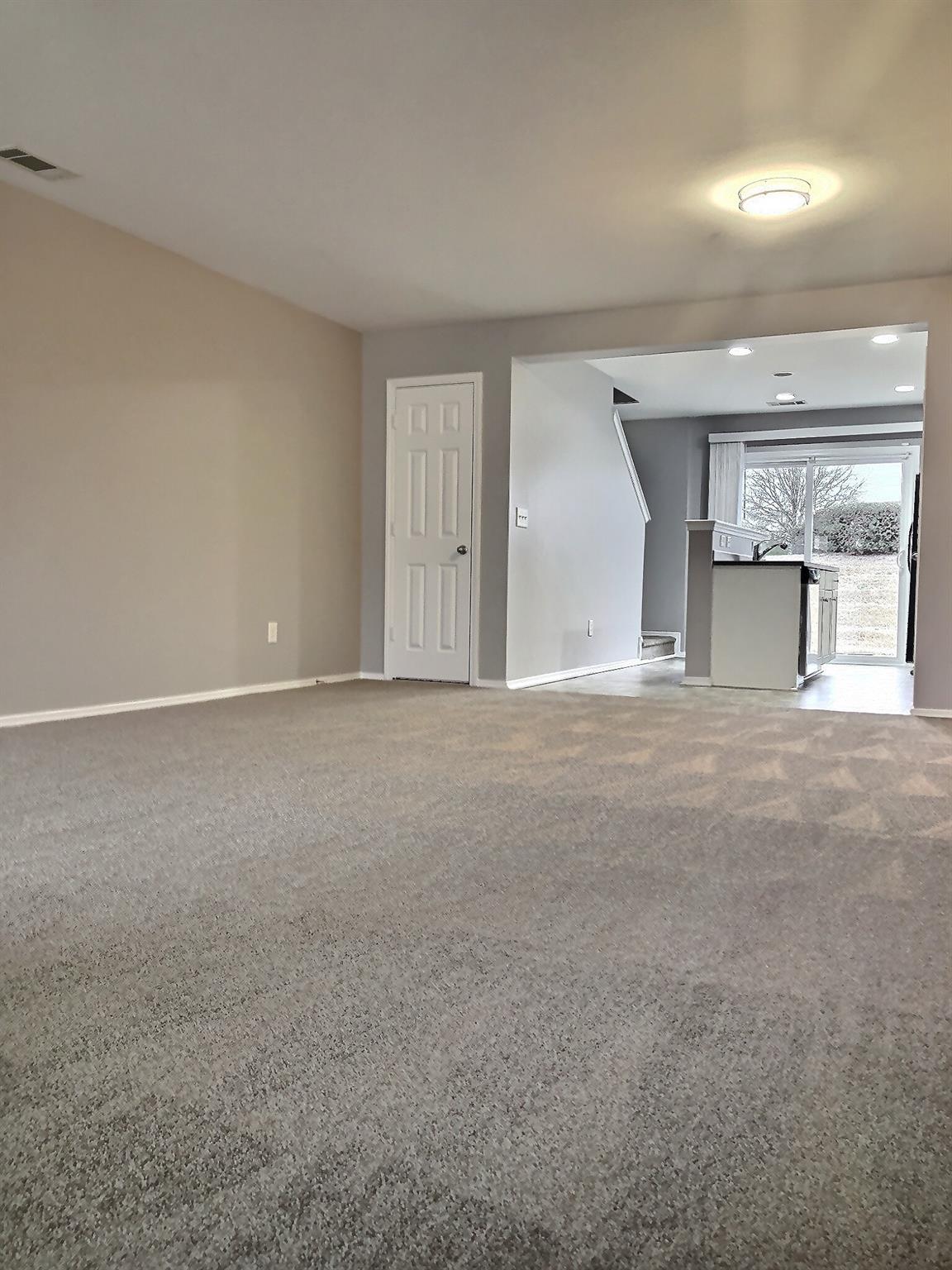 338 River Clay Road Fort Mill, SC 29708 - Photo 5 of 18 a view of an empty room with a fireplace