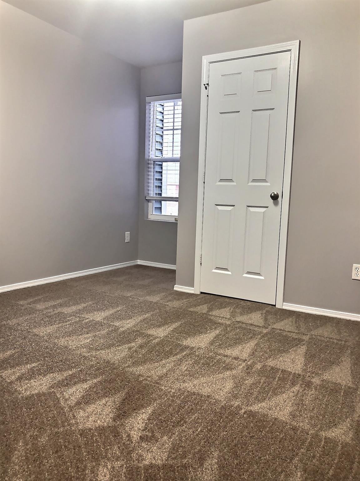 338 River Clay Road Fort Mill, SC 29708 - Photo 9 of 18 a view of an empty room with a window