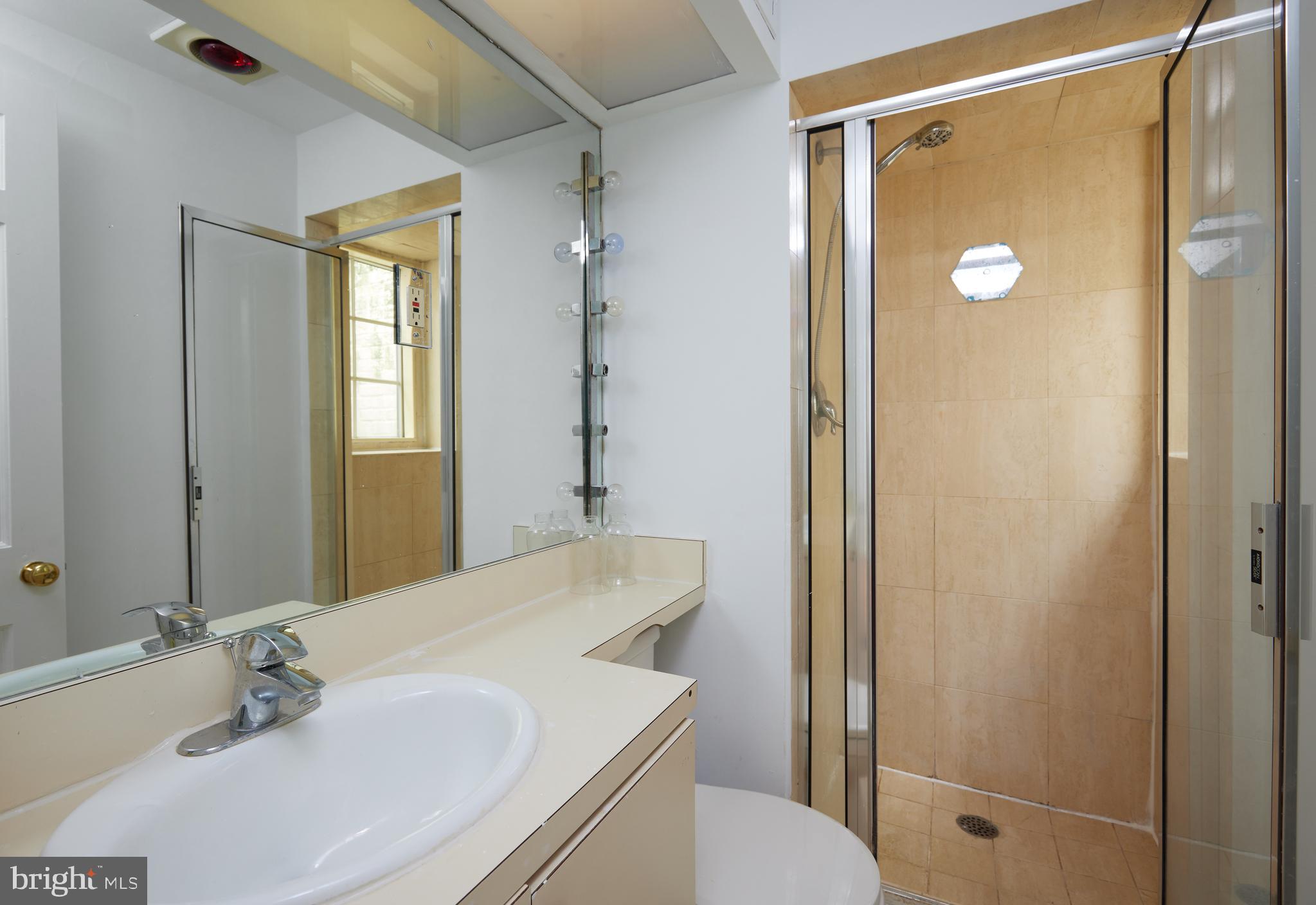 3057 Q Street Northwest Washington, DC 20007 - Photo 8 of 52 Entry Level Bathroom