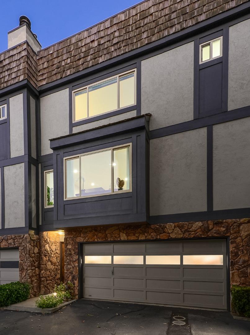33 Park Road, Unit 10 Burlingame, CA 94010 - Photo 1 of 41 a front view of a house with a garage