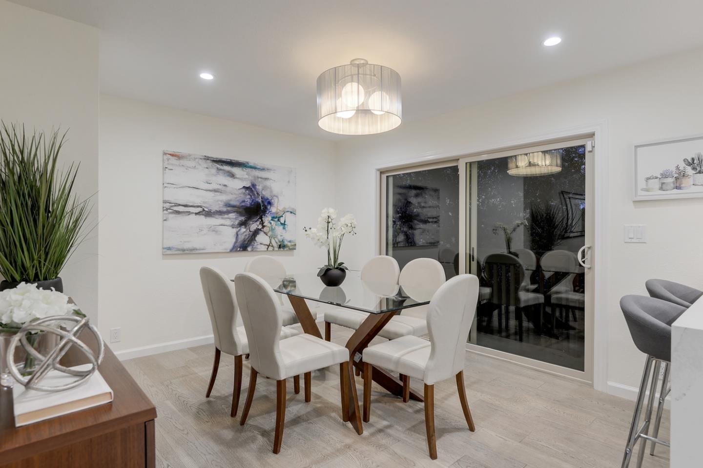 33 Park Road, Unit 10 Burlingame, CA 94010 - Photo 13 of 41 a dining room with furniture and window