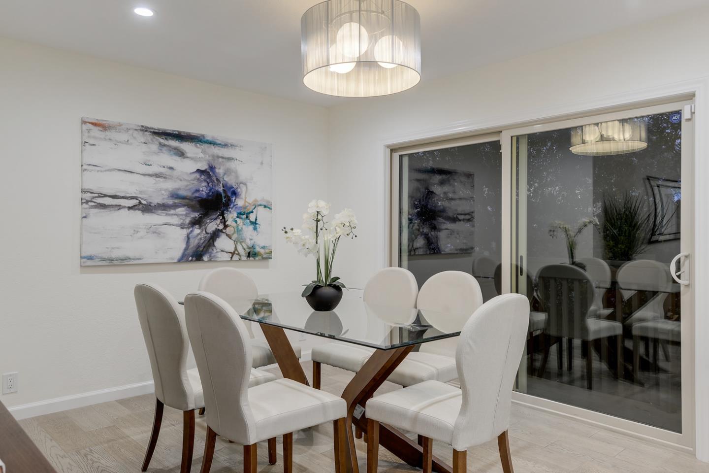 33 Park Road, Unit 10 Burlingame, CA 94010 - Photo 14 of 41 a dining room with furniture and window