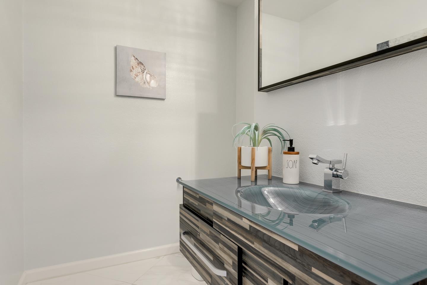 33 Park Road, Unit 10 Burlingame, CA 94010 - Photo 20 of 41 a kitchen with a sink and a microwave