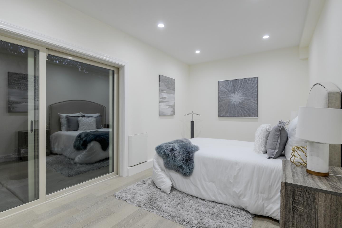 33 Park Road, Unit 10 Burlingame, CA 94010 - Photo 28 of 41 a bedroom with a bed and walk in closet