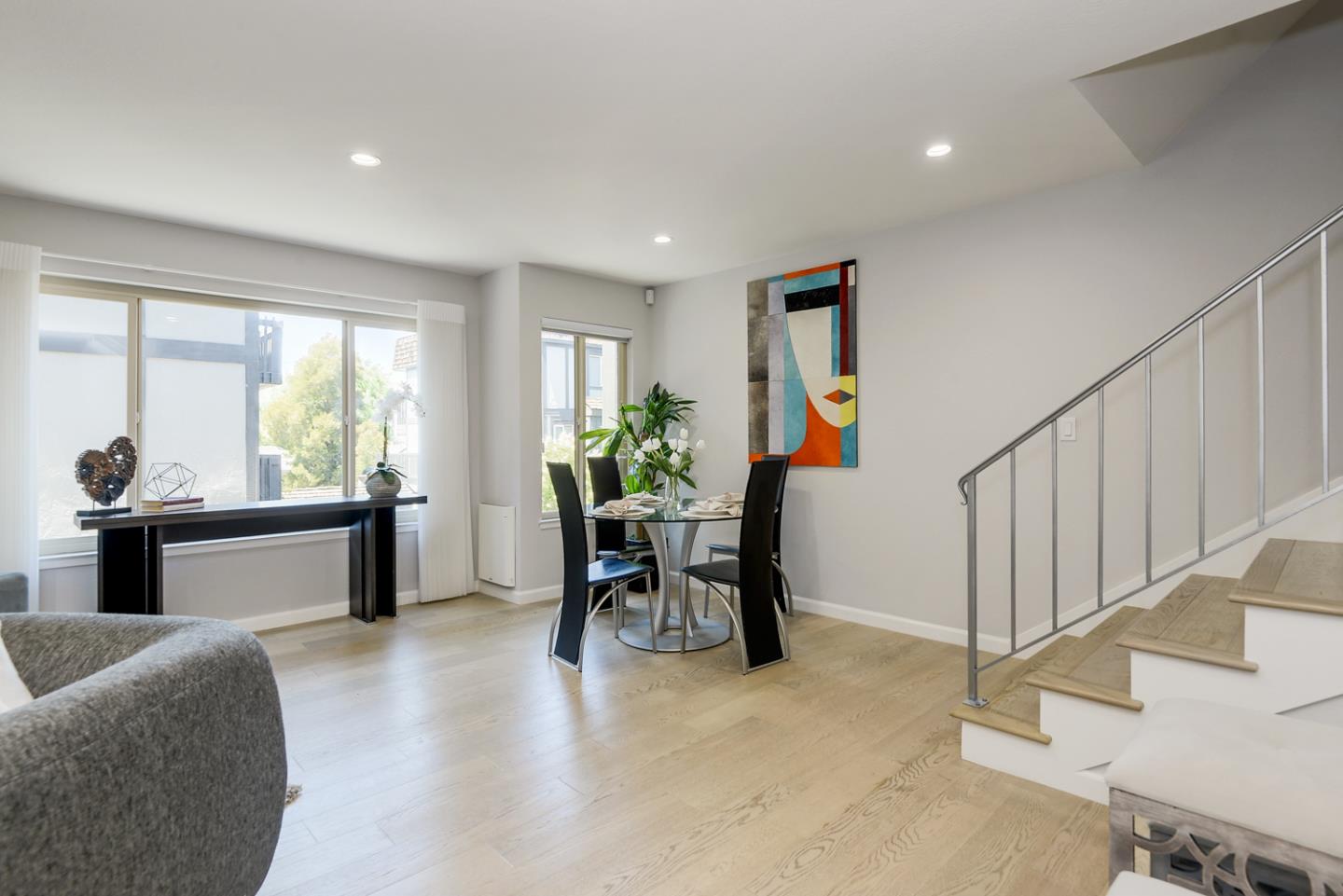 33 Park Road, Unit 10 Burlingame, CA 94010 - Photo 3 of 41 a dining room with furniture window and wooden floor