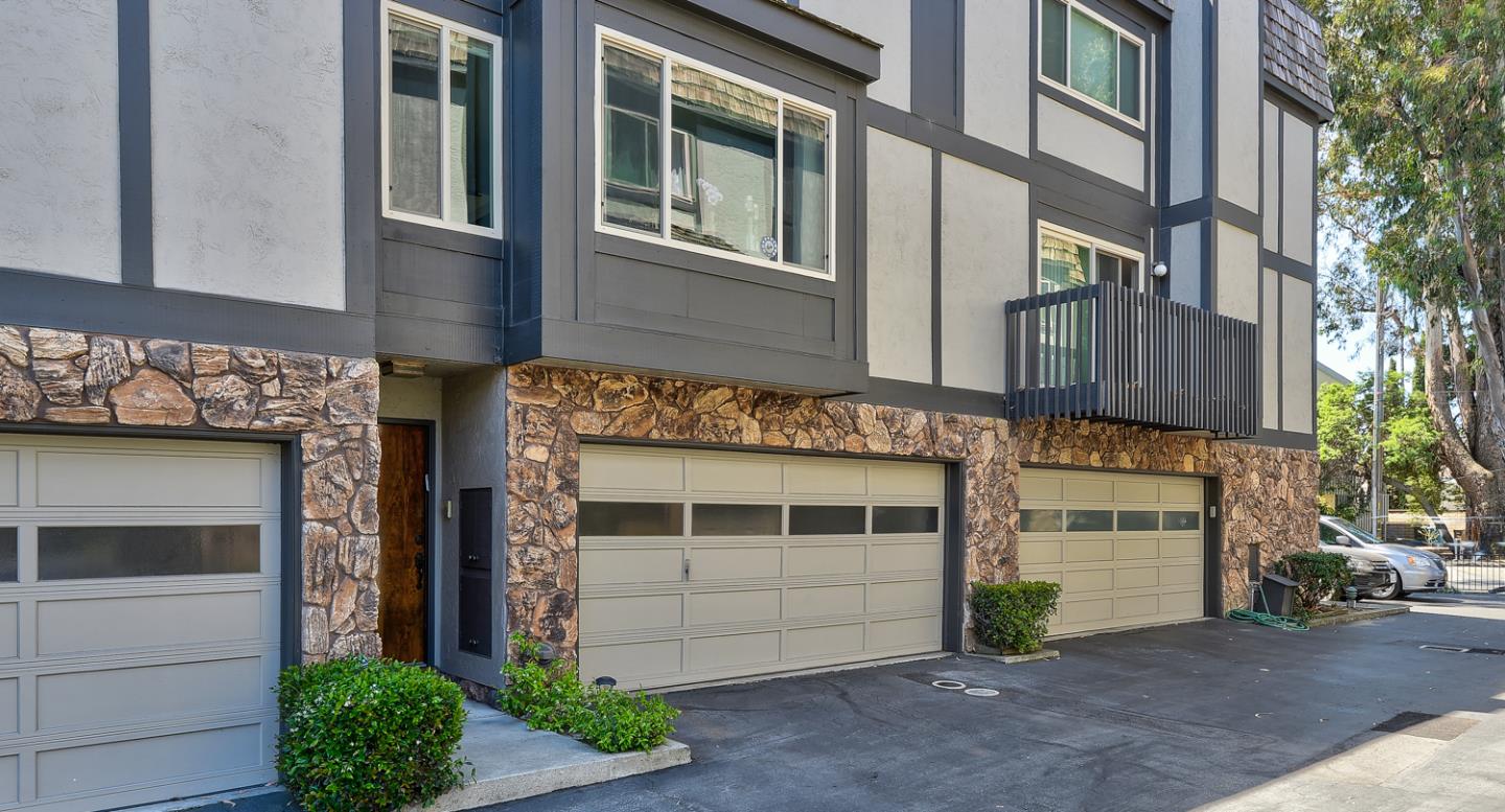 33 Park Road, Unit 10 Burlingame, CA 94010 - Photo 38 of 41 a front view of a building with a garage