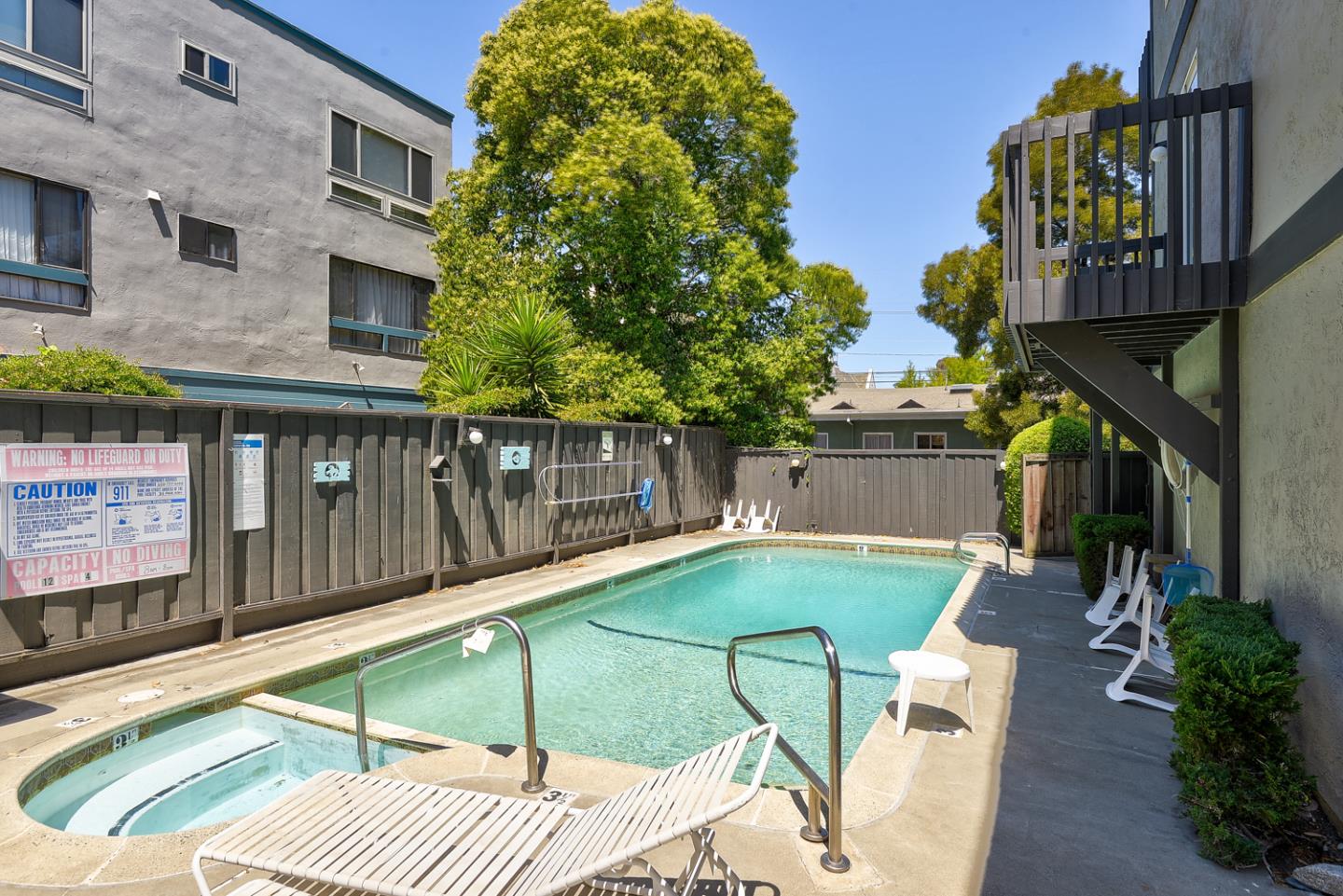 33 Park Road, Unit 10 Burlingame, CA 94010 - Photo 40 of 41 a view of a patio with chairs and potted plants