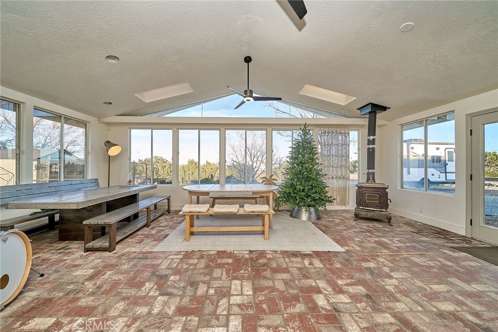 9783 Corton Street Phelan, CA 92371 - Photo 25 of 29 a living room with furniture large window with outer view