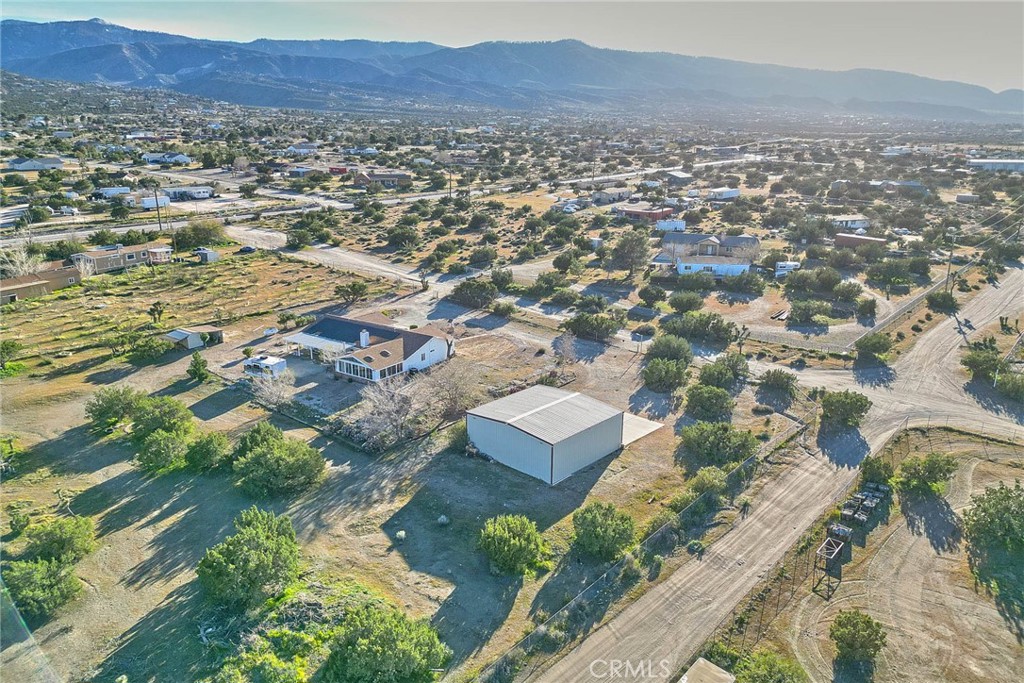 9783 Corton Street Phelan, CA 92371 - Photo 29 of 29 an aerial view of residential house and sandy dunes