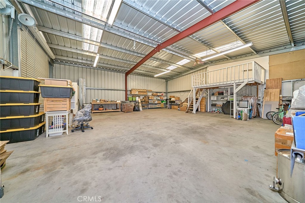 9783 Corton Street Phelan, CA 92371 - Photo 6 of 29 a view of parking garage with lots of traffic