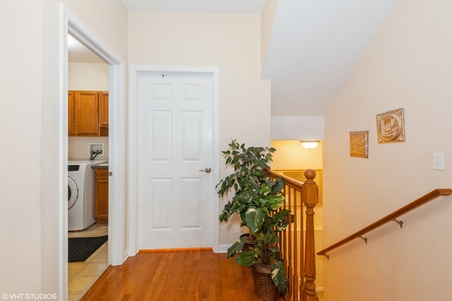 152 Orchards Pass Bartlett, IL 60103 - Photo 15 of 40 a view of a bedroom with a hallway