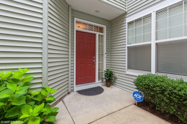 152 Orchards Pass Bartlett, IL 60103 - Photo 3 of 40 a view of a back yard of the house