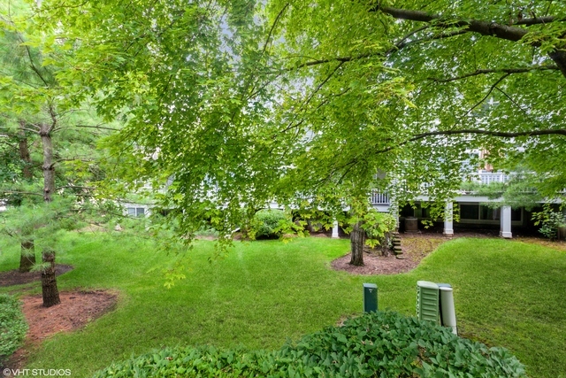 152 Orchards Pass Bartlett, IL 60103 - Photo 35 of 40 a view of a backyard with sitting area