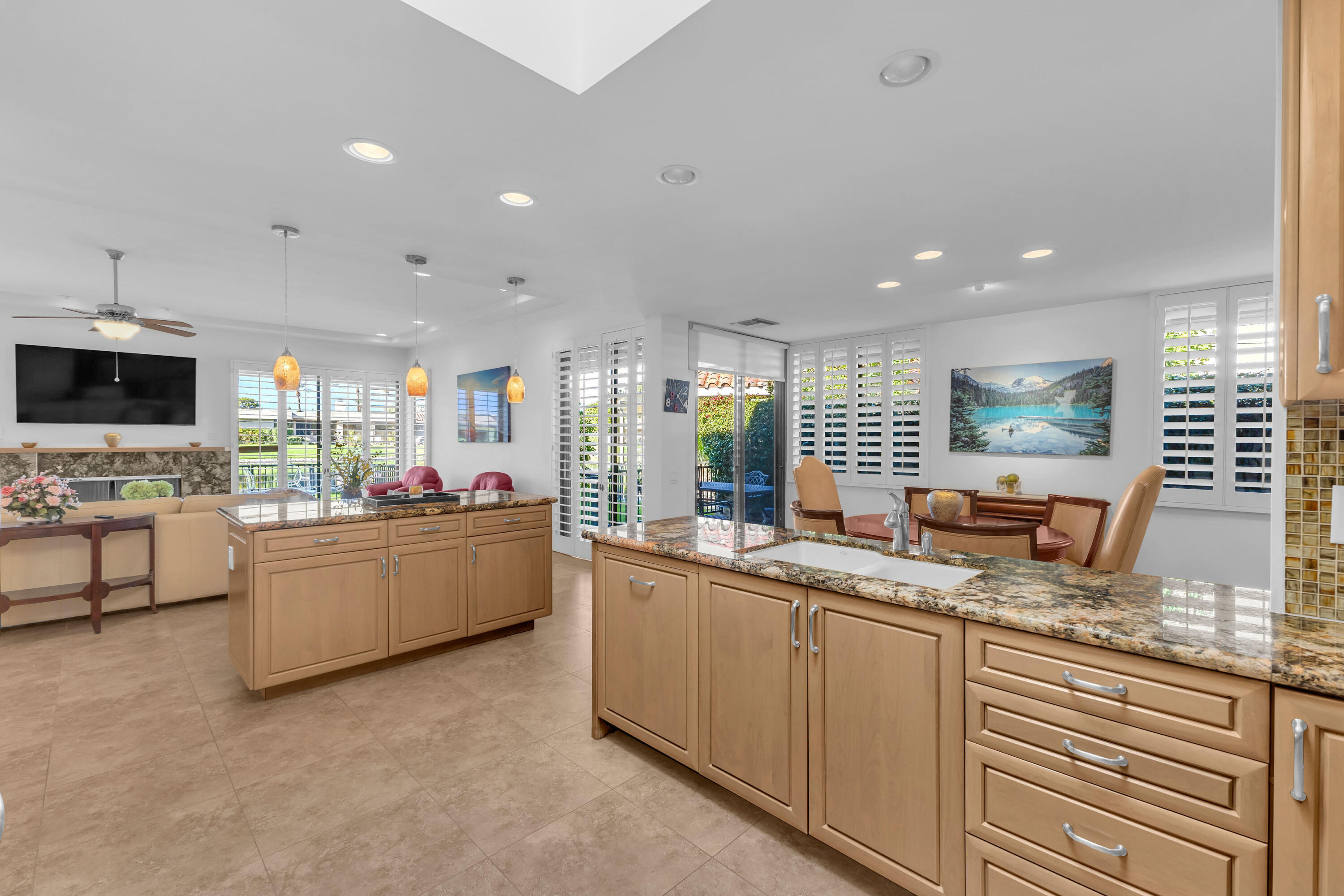 10 Colgate Drive Rancho Mirage, CA 92270 - Photo 19 of 43 a kitchen with counter top space sink cabinets and appliances