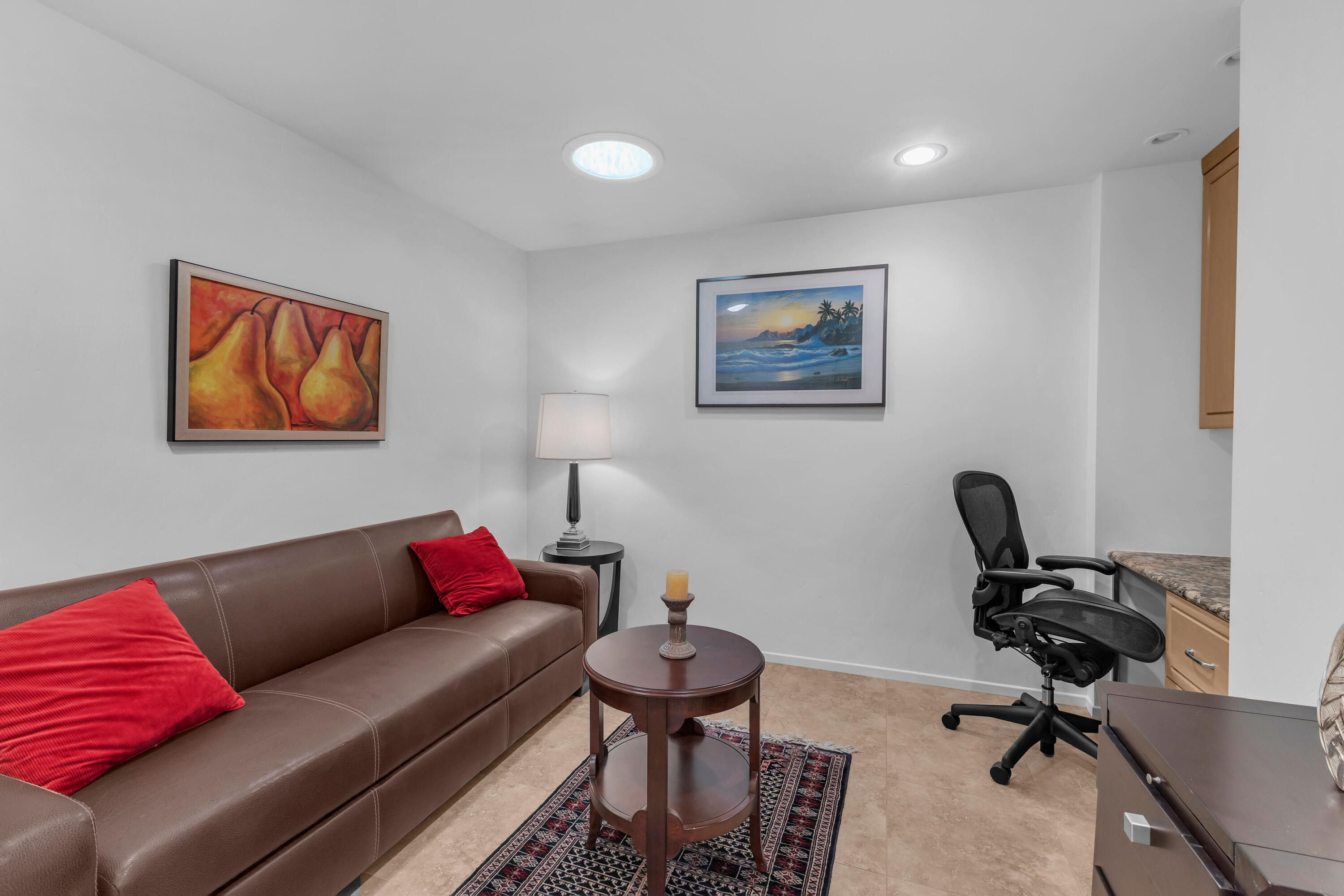 10 Colgate Drive Rancho Mirage, CA 92270 - Photo 28 of 49 a view of a livingroom with workspace and a couch
