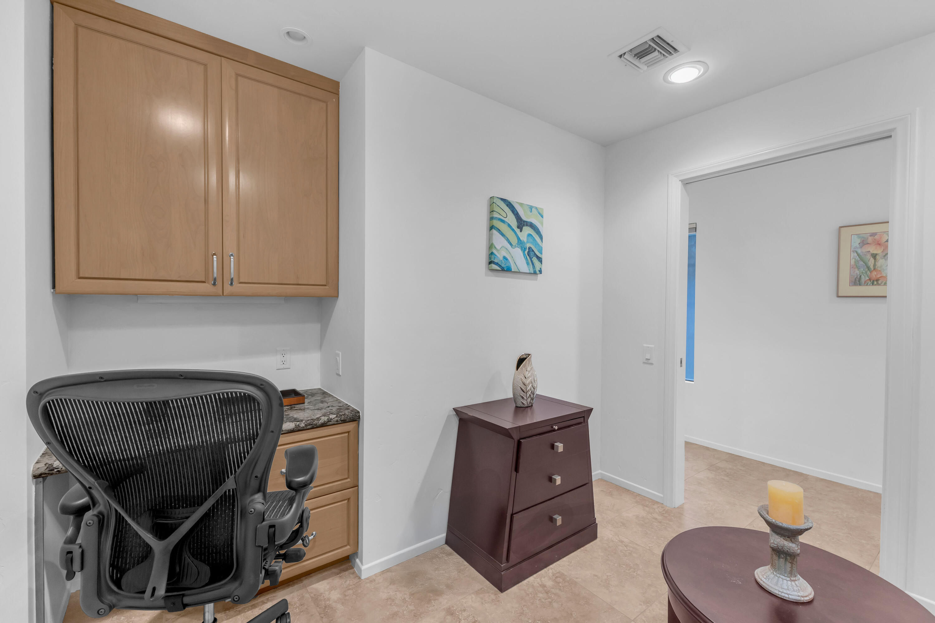 10 Colgate Drive Rancho Mirage, CA 92270 - Photo 29 of 49 a kitchen with a sink a stove and cabinets