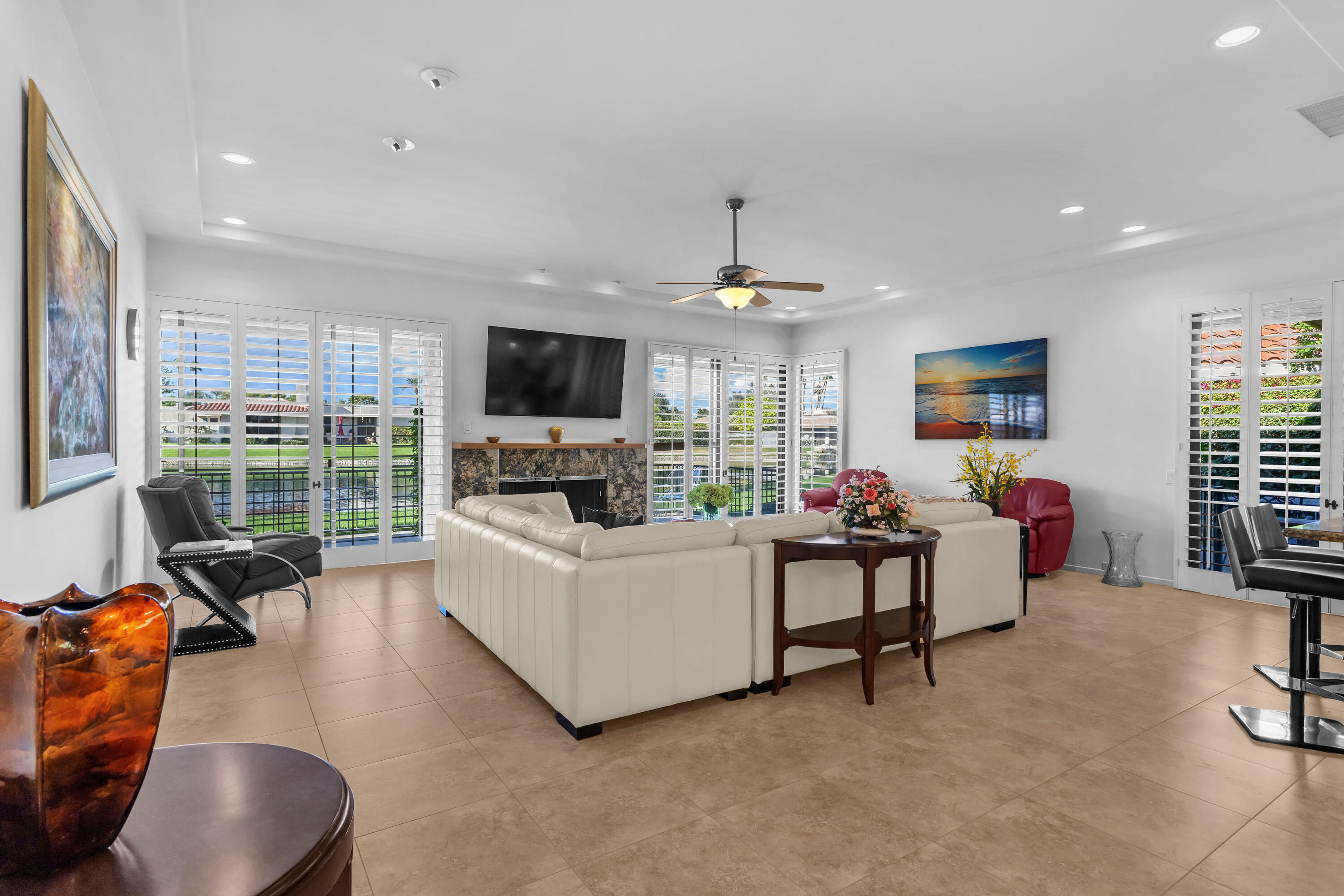 10 Colgate Drive Rancho Mirage, CA 92270 - Photo 4 of 49 a living room with furniture and a flat screen tv