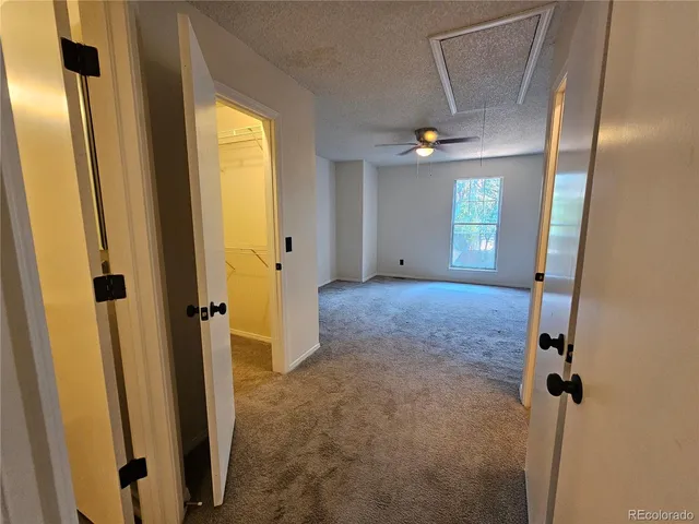 a view of entryway with livingroom