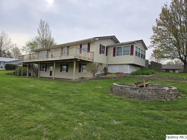 704 Orchard Lane Carthage, IL 62321 - Photo 30 of 36 a view of house with a yard