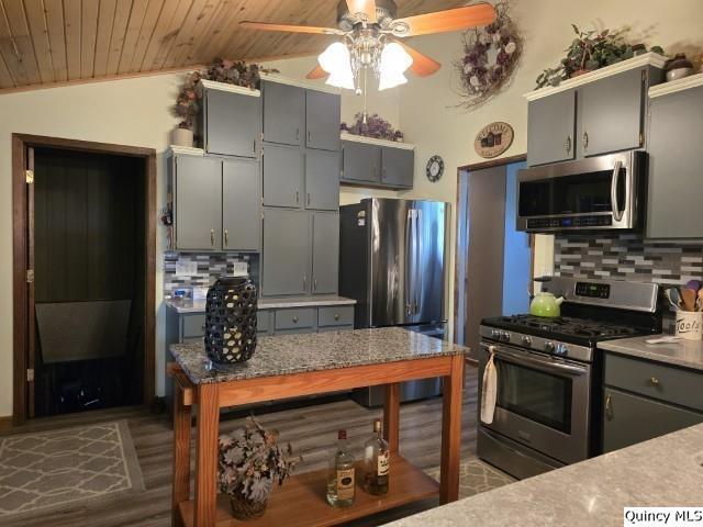 704 Orchard Lane Carthage, IL 62321 - Photo 3 of 36 a kitchen with stainless steel appliances a stove refrigerator and microwave