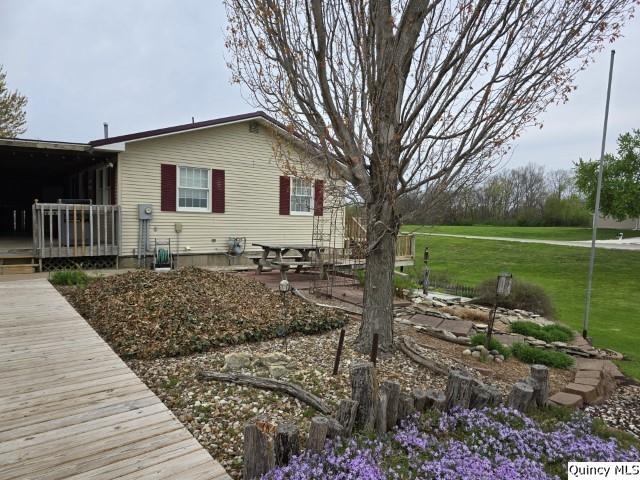 704 Orchard Lane Carthage, IL 62321 - Photo 31 of 36 a view of a house with a yard