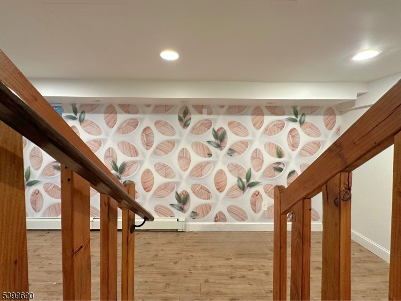 755 Preakness Avenue Wayne, NJ 07470 - Photo 26 of 35 a view of balcony with wooden floor and fence