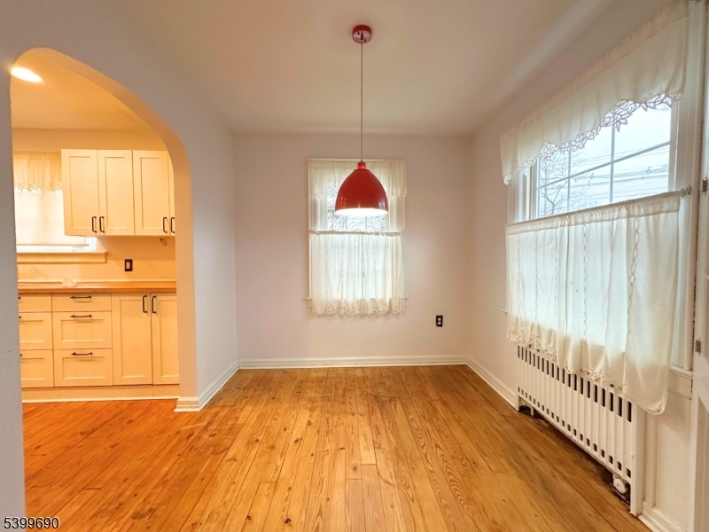755 Preakness Avenue Wayne, NJ 07470 - Photo 10 of 35 a room with window and a wooden floor
