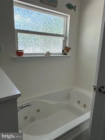 a bathroom with a bathtub