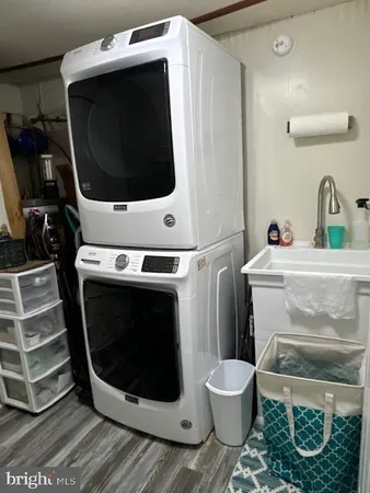 a bathroom with a toilet and a washing machine