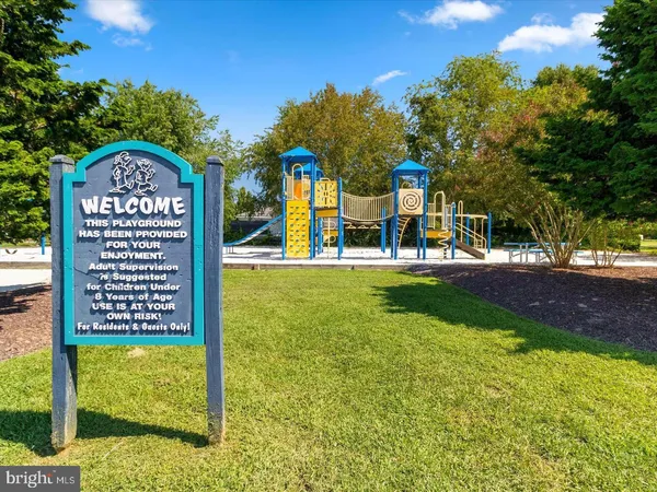 a view of a park with welcome board