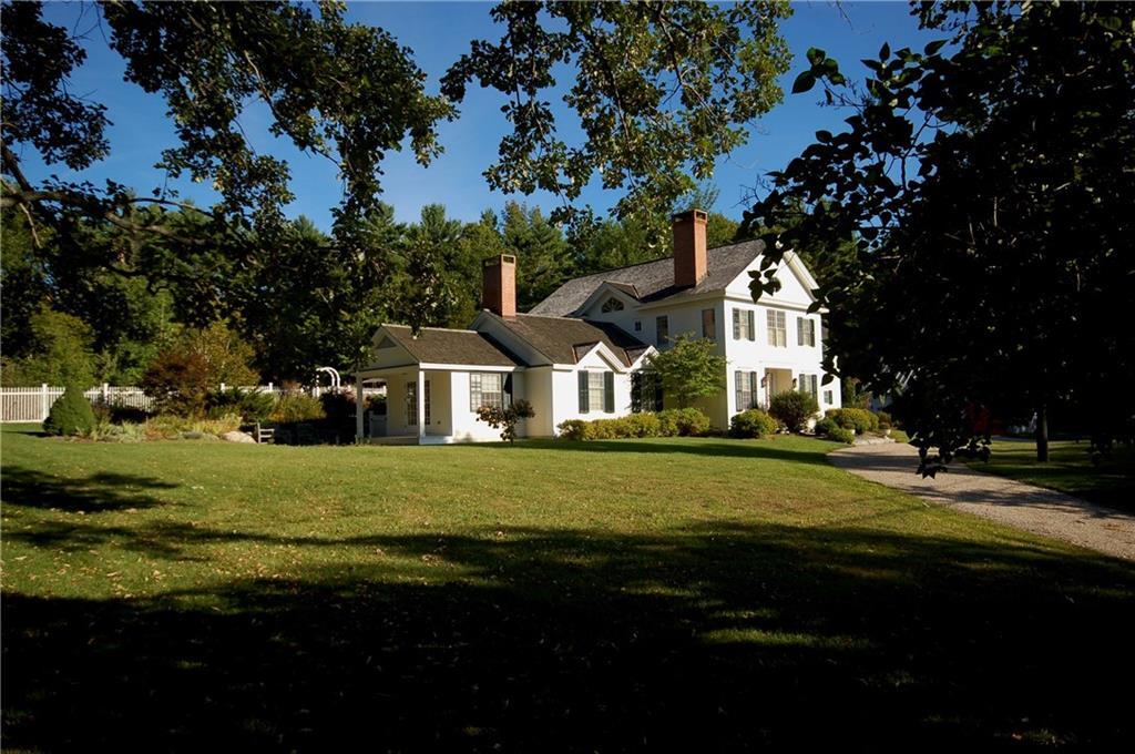 339 Taconic Road Salisbury, CT 06068 - Photo 1 of 1 a front view of a house with a garden