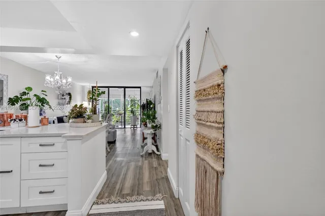 a view of a hallway and a living room