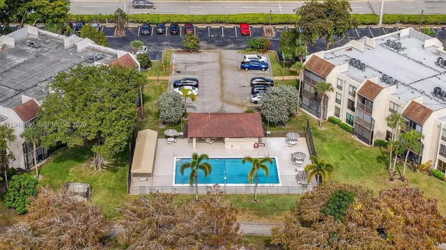 an aerial view of a house with a garden
