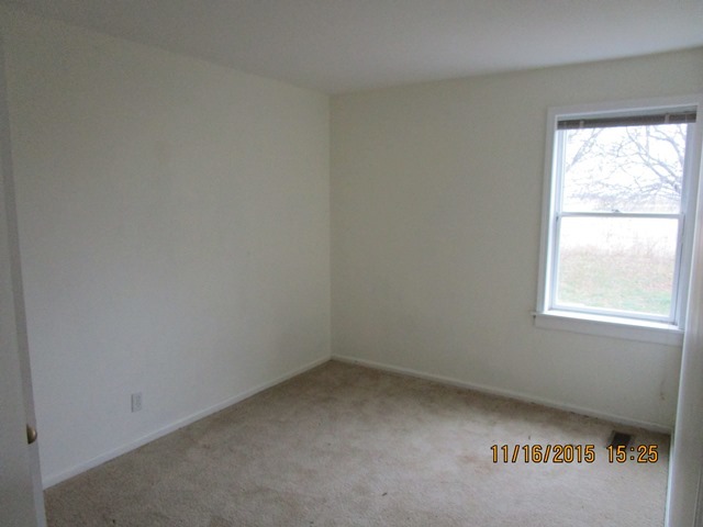 17333 East Lind Road Rochelle, IL 61068 - Photo 16 of 25 an empty room with a window