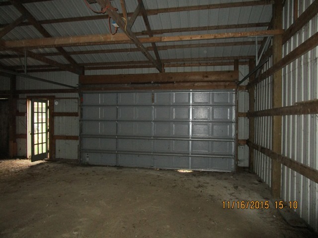 17333 East Lind Road Rochelle, IL 61068 - Photo 6 of 25 a view of an empty room with a staircase