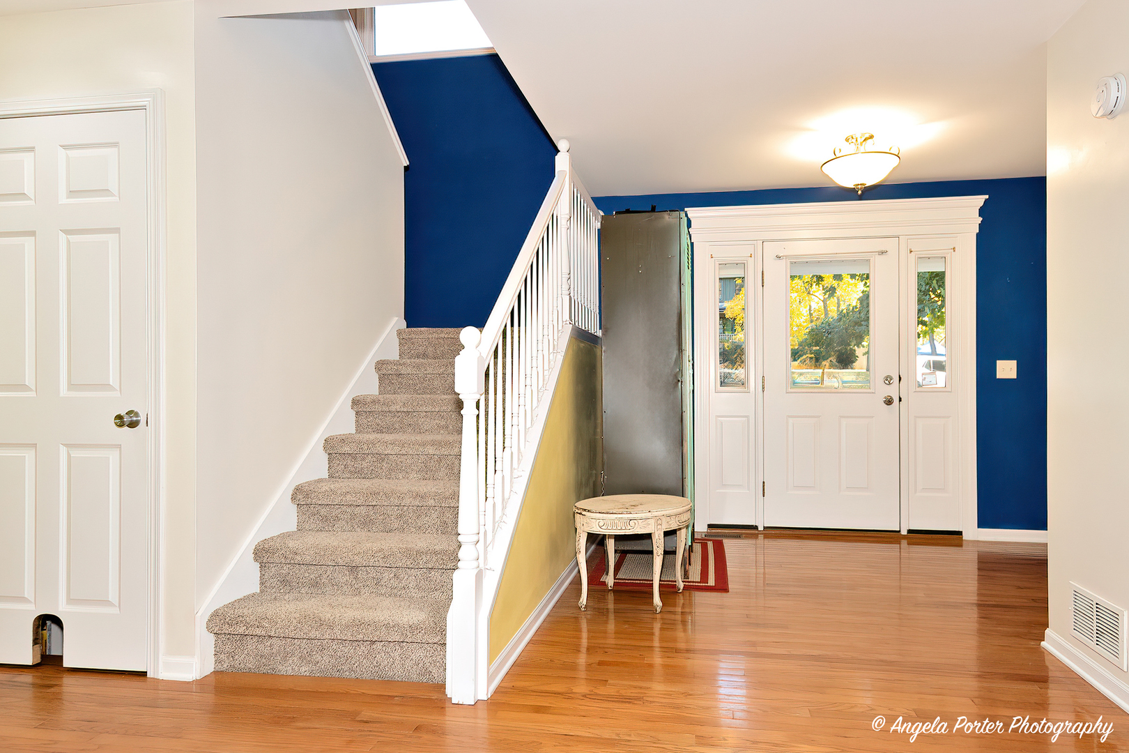 6715 Normandy Drive Spring Grove, IL 60081 - Photo 2 of 31 a view of entryway and hall with wooden floor