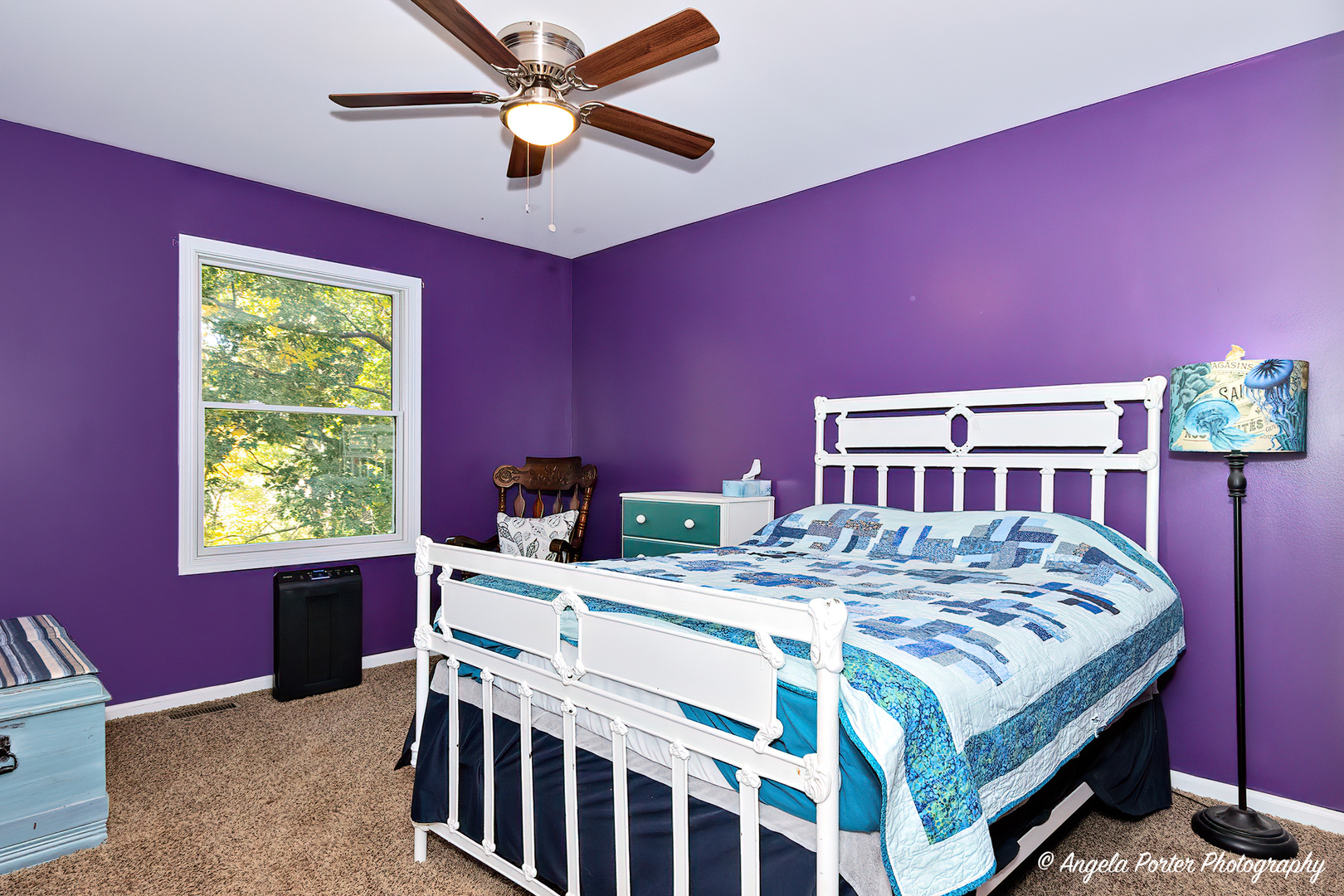 6715 Normandy Drive Spring Grove, IL 60081 - Photo 21 of 31 a bed room with a bed and a chandelier