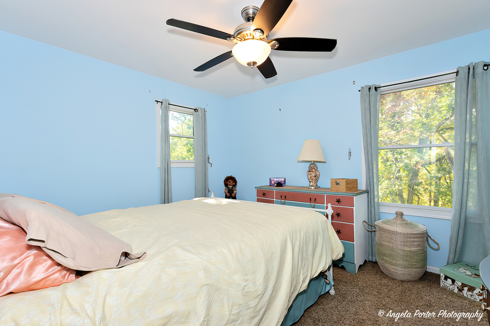6715 Normandy Drive Spring Grove, IL 60081 - Photo 22 of 31 a bed sitting in a bedroom next to a window