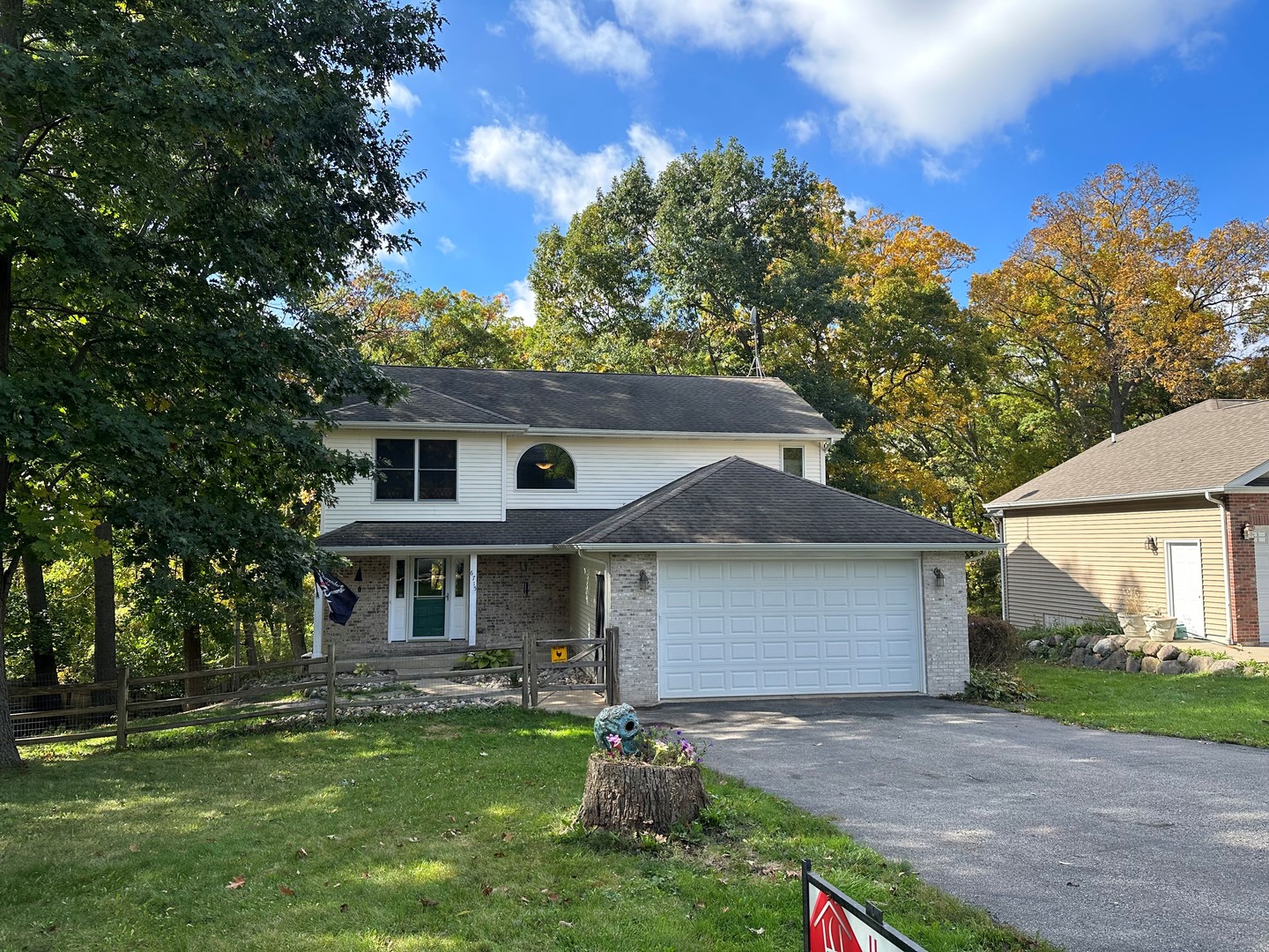 6715 Normandy Drive Spring Grove, IL 60081 - Photo 31 of 31 a front view of a house with garden