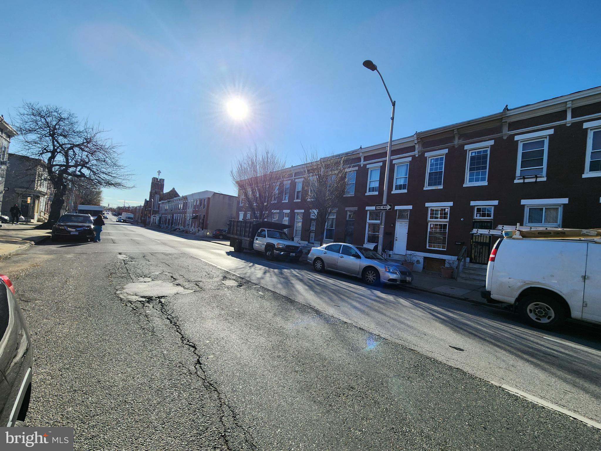 2631 East Madison Street Baltimore, MD 21205 - Photo 2 of 16 a view of car parked in front of house