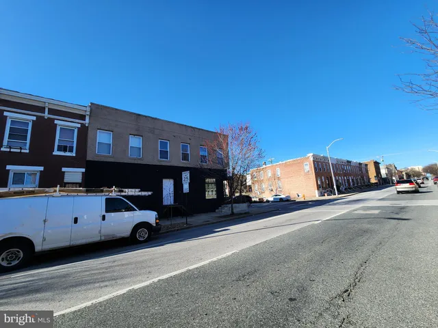 a car parked in front of a building