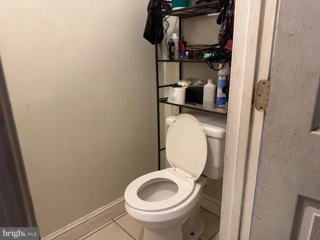 a bathroom with a toilet and a sink