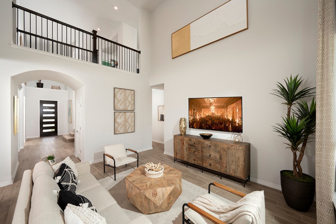 420 Ridgewell Loop Georgetown, TX 78633 - Photo 12 of 25 a living room with furniture and a flat screen tv