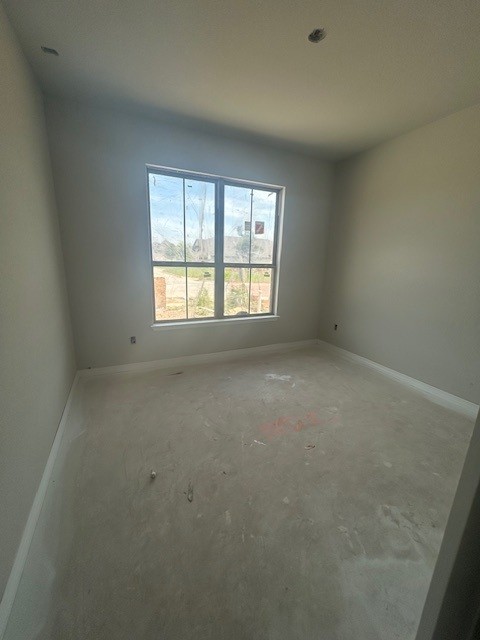 420 Ridgewell Loop Georgetown, TX 78633 - Photo 8 of 25 an empty room with a window