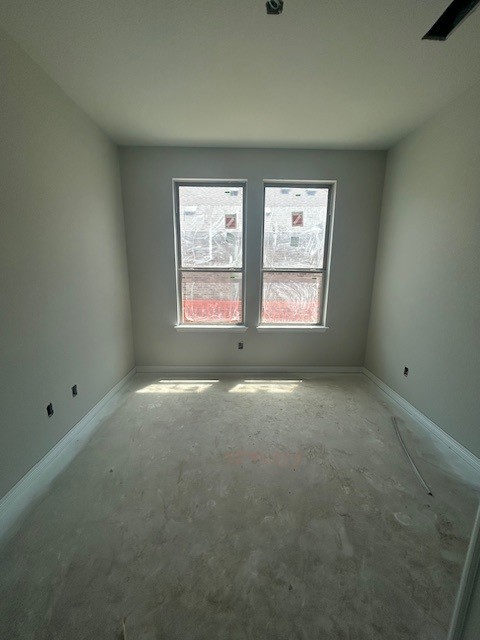 420 Ridgewell Loop Georgetown, TX 78633 - Photo 9 of 25 an empty room with windows