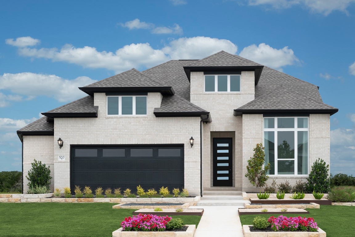 420 Ridgewell Loop Georgetown, TX 78633 - Photo 10 of 25 a front view of a house with garden